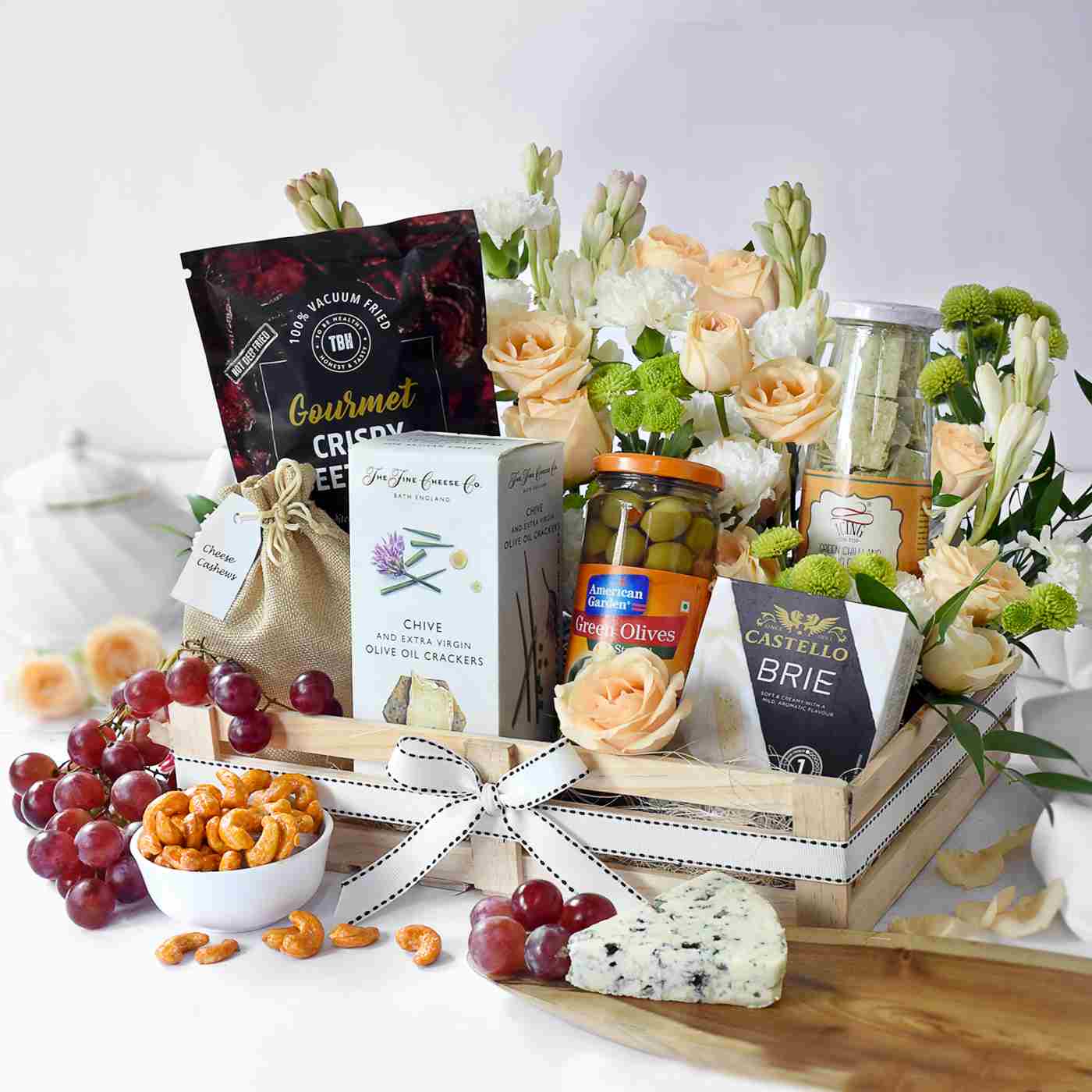 Premium gift hampers by Interflora India with flowers and treats